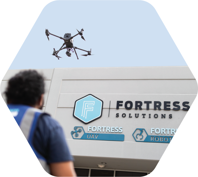A drone in the sky over Fortress Plano, TX location.